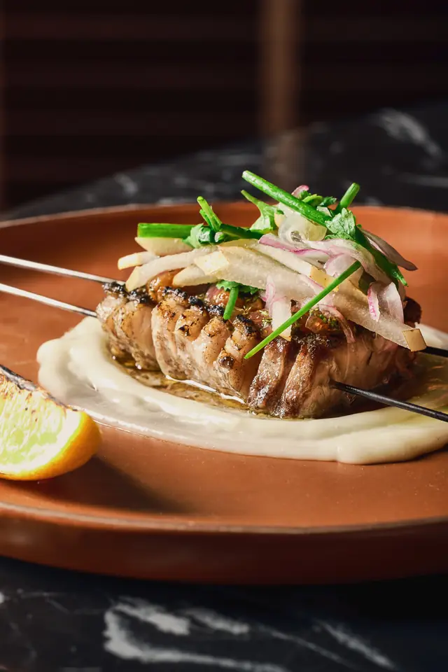 Barramundi skewer with chili toum