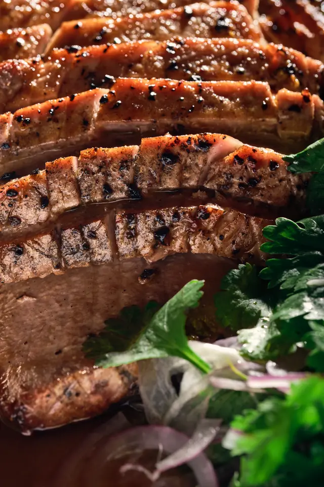 Sliced wagyu, seared and fanned out with herbs